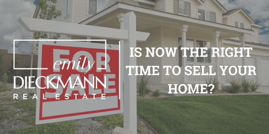 For sale sign outside a modern home with Emily Dieckmann Real Estate branding.